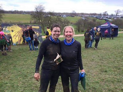 Runners wearing Ruffnek scarf around their necks after completing the Major series Mud run!