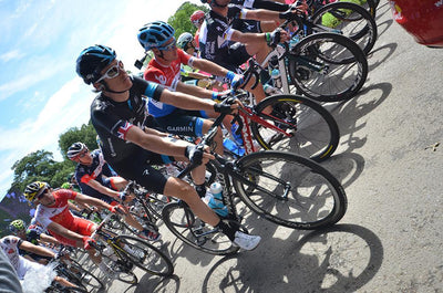 A photo of the start of the Tour de France in Yorkshire, showing our UK cyclist with his Union Jack flag on his arm,